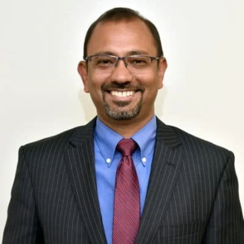 Dr. Arshad William