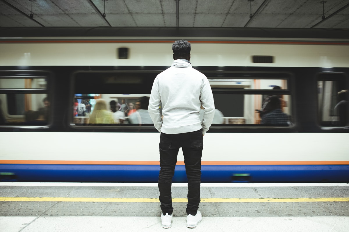 man waiting for the subway train